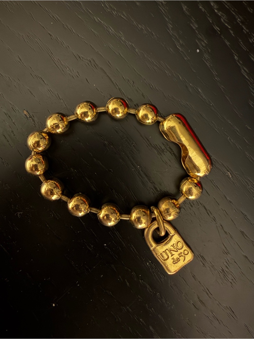 UNO de 50 Gold Beaded Statement Bracelet with Padlock Charm